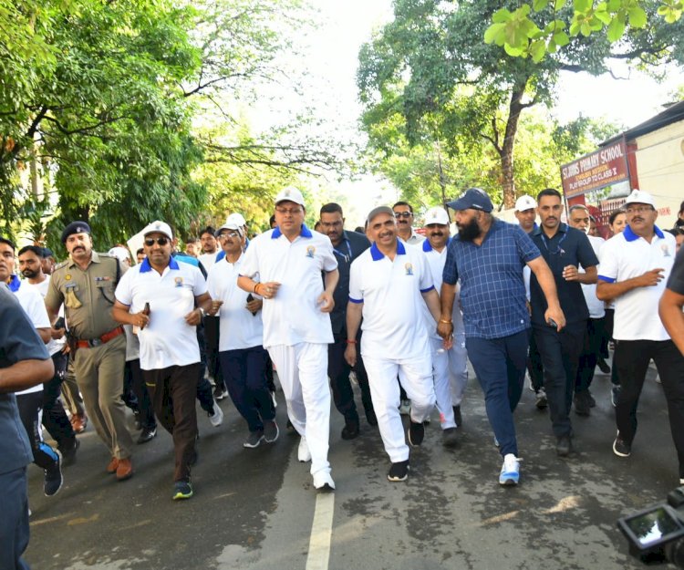 'रन फॉर योग' कार्यक्रम के तहत आयोजित दौड़ में शामिल हुए सीएम धामी